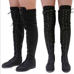 Thigh high lace up boots